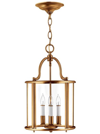 Gentry Foyer Pendant With 4 Lights in Heirloom Brass.